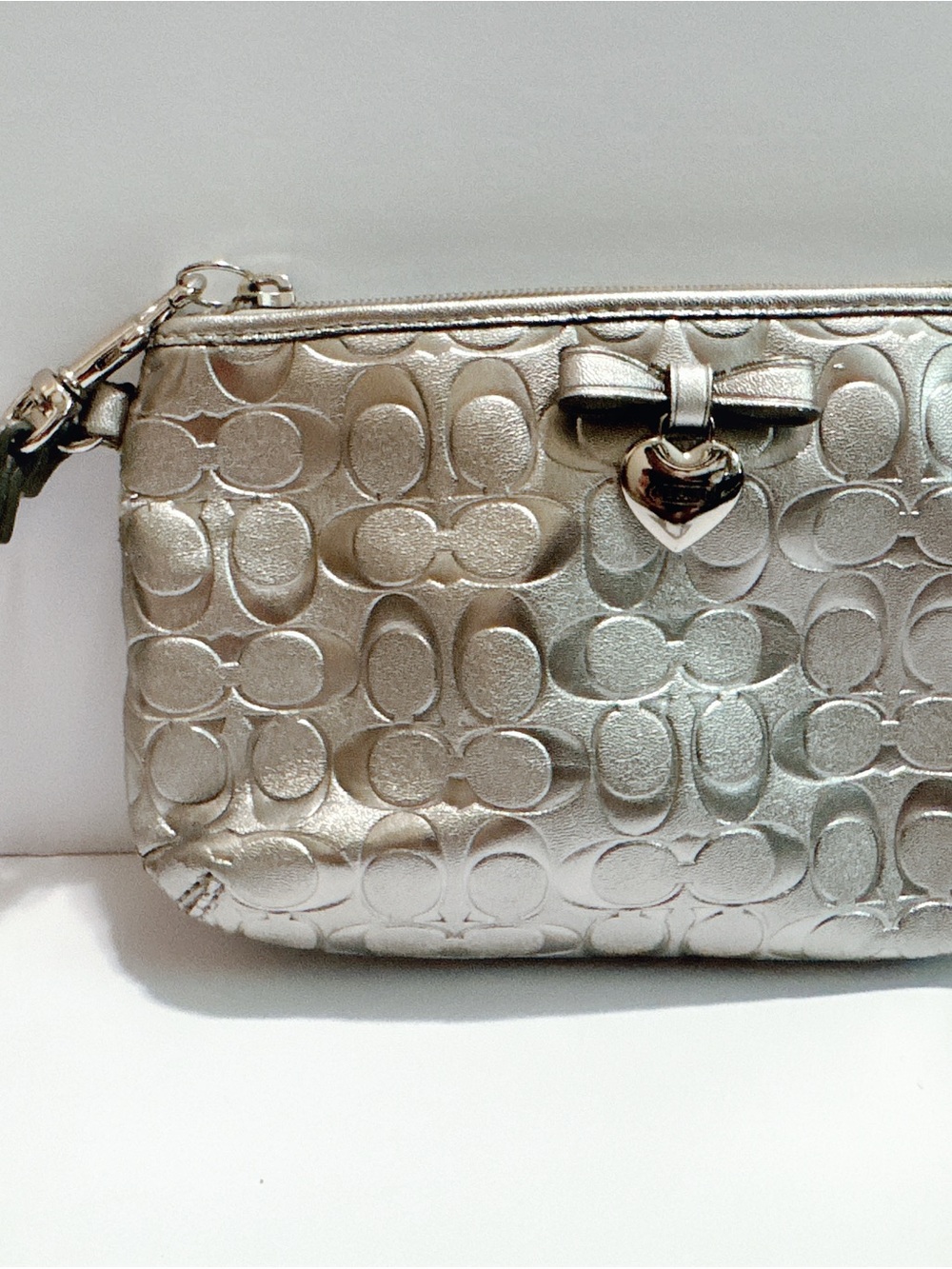 Coach Metallic Silver Signature Heart Charm Wristlet with Bow Accent